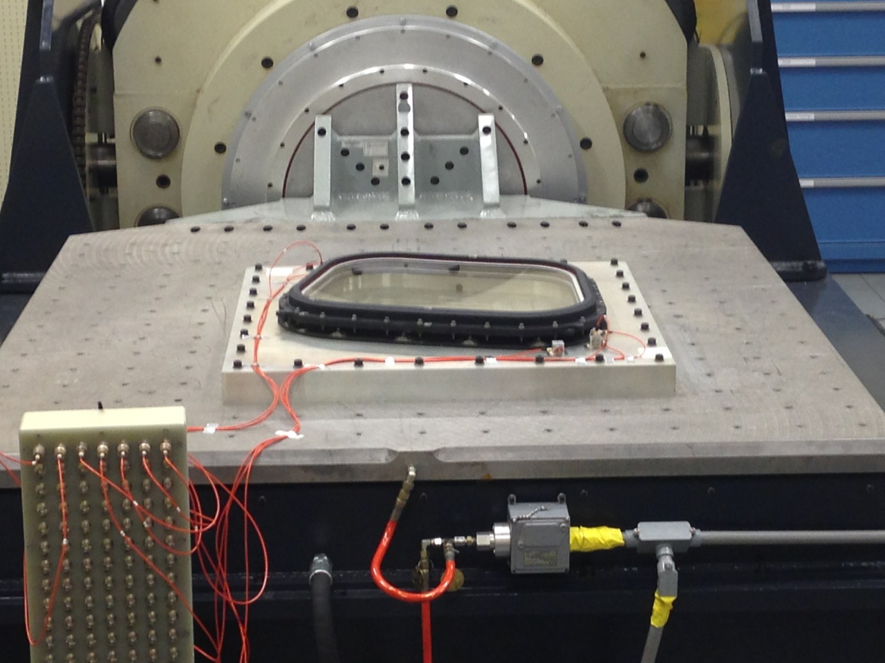One of Orion’s windows is evaluated in a test fixture.