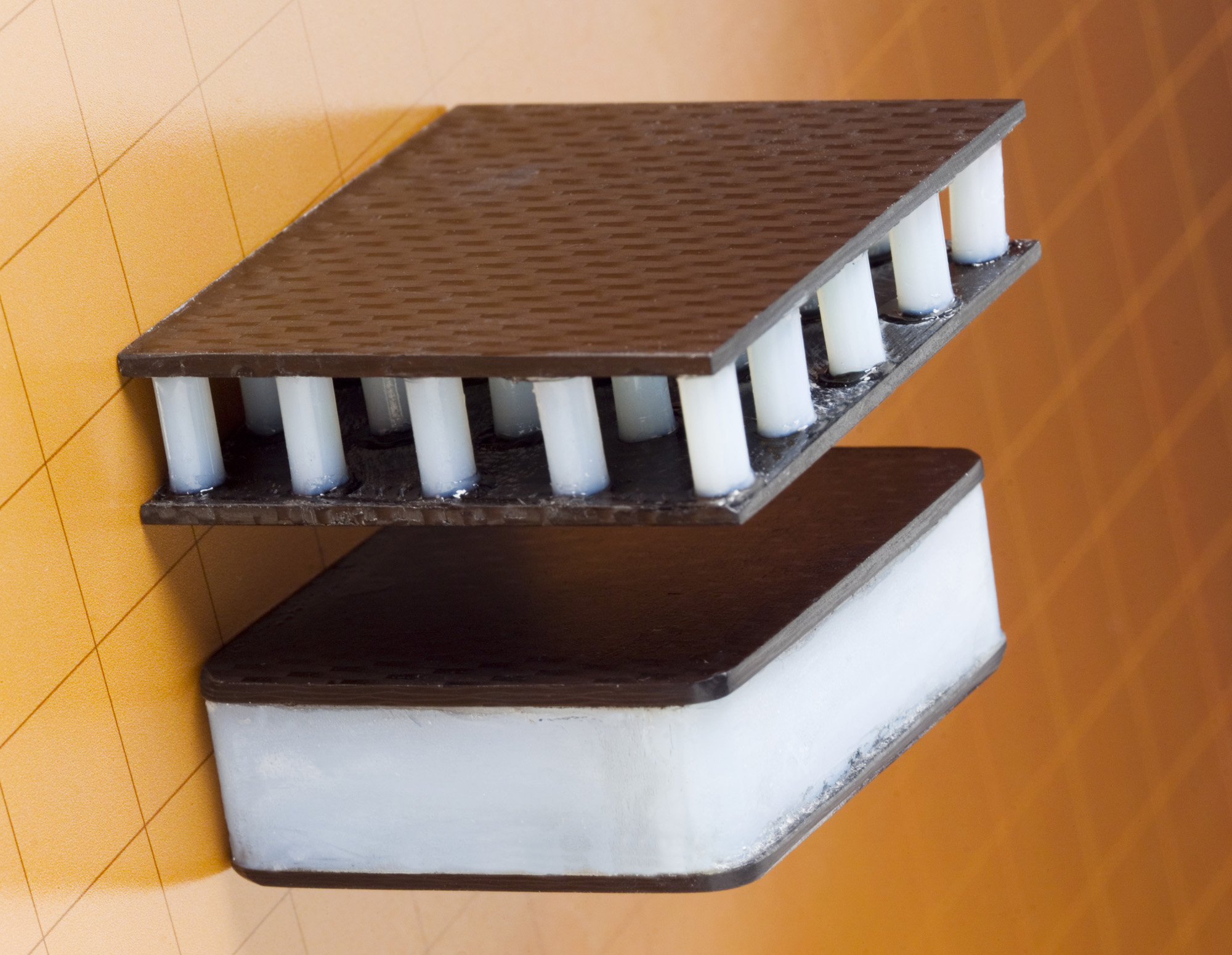 Comparison of aerogel post and slab-based sandwich structures.