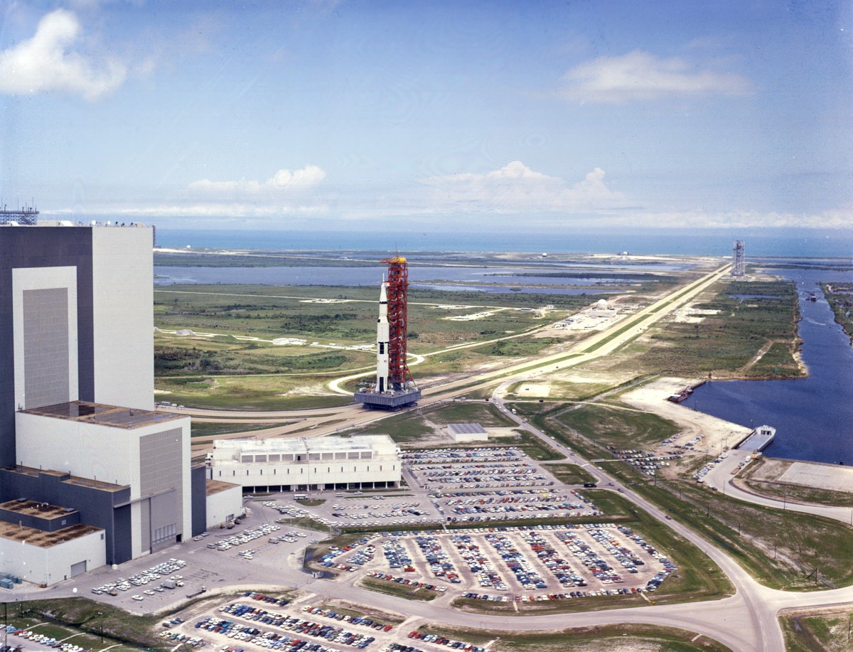 Saturn V rocket sits at Cape beside large building