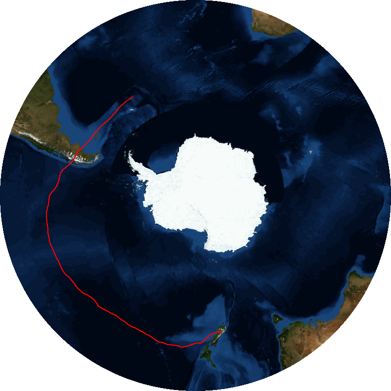 A satellite Image of Antartica, with a red ground trail halfway to the edge on the left side. Between Antartica, a large white landmass in the center, and the narrow curved tail of south america posed horizontally on the leftt side runs a bright red trail on the horizontal section of the circular satellite image.