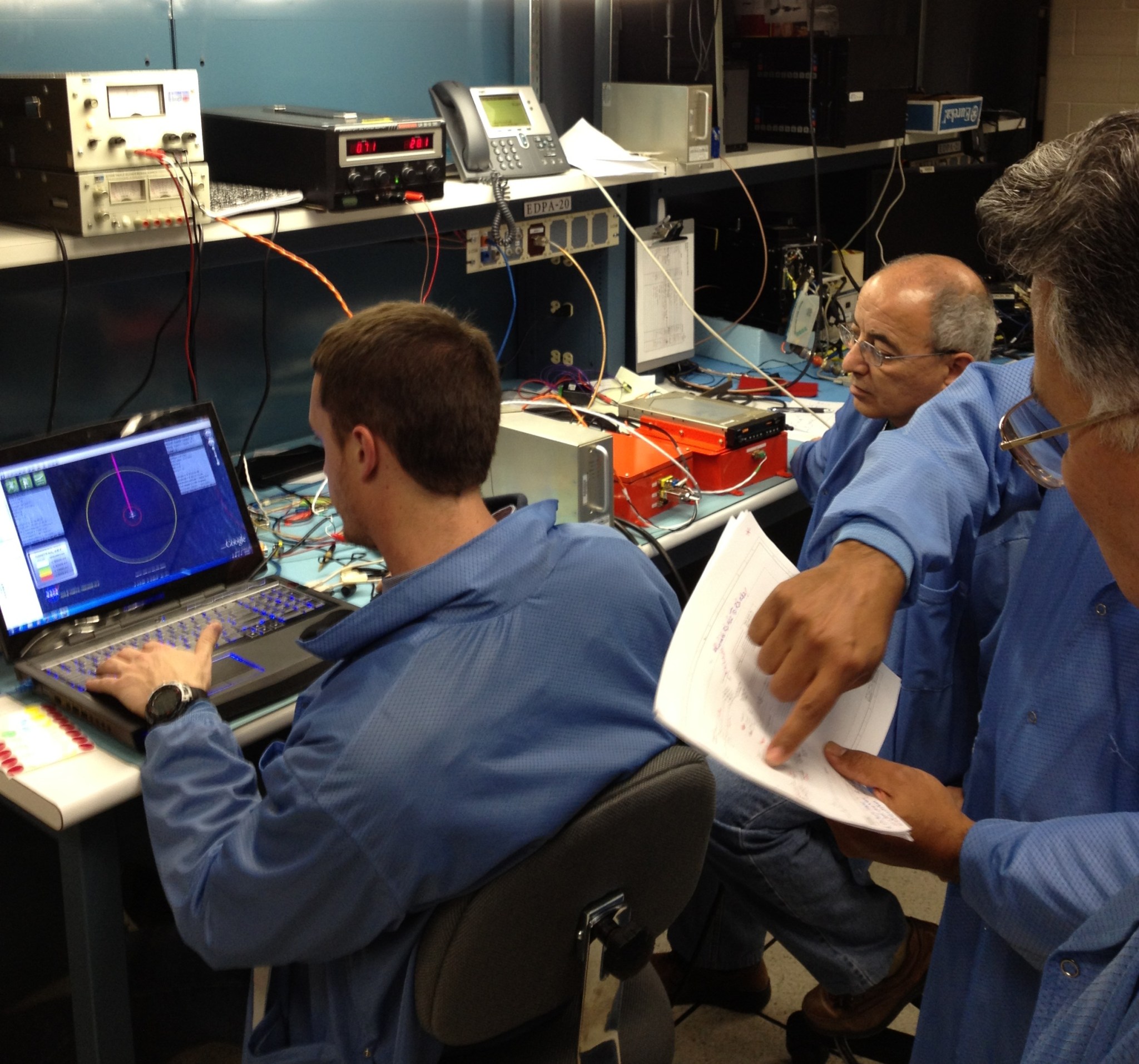 NASA Dryden engineers and technicians bench-check the ADS-B unit and software interface.