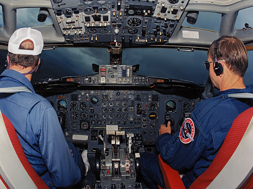 Pilots inside the cockpit of the 737 aircraft.