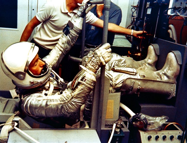 Astronaut Scott Carpenter in a mock-up of his pilot's seat