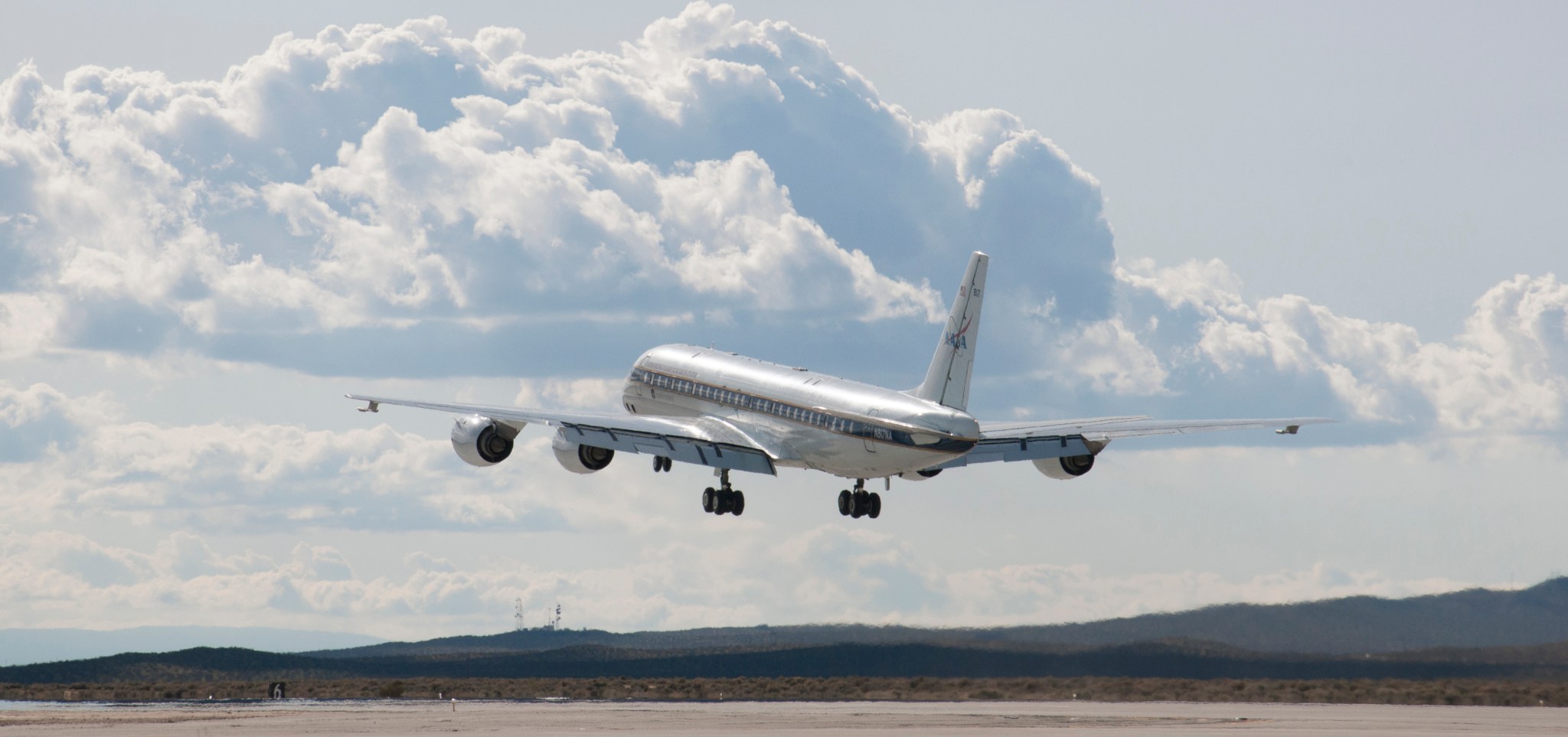 NASA's DC-8 aircraft takes off from its base operations in Palmdale, California on a mission aimed at studying polar winds.