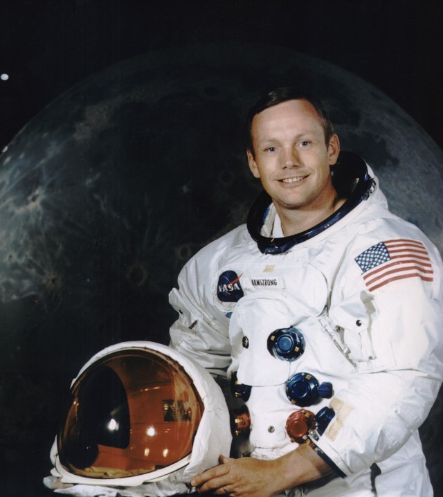 Neil Armstrong posing in spacesuit