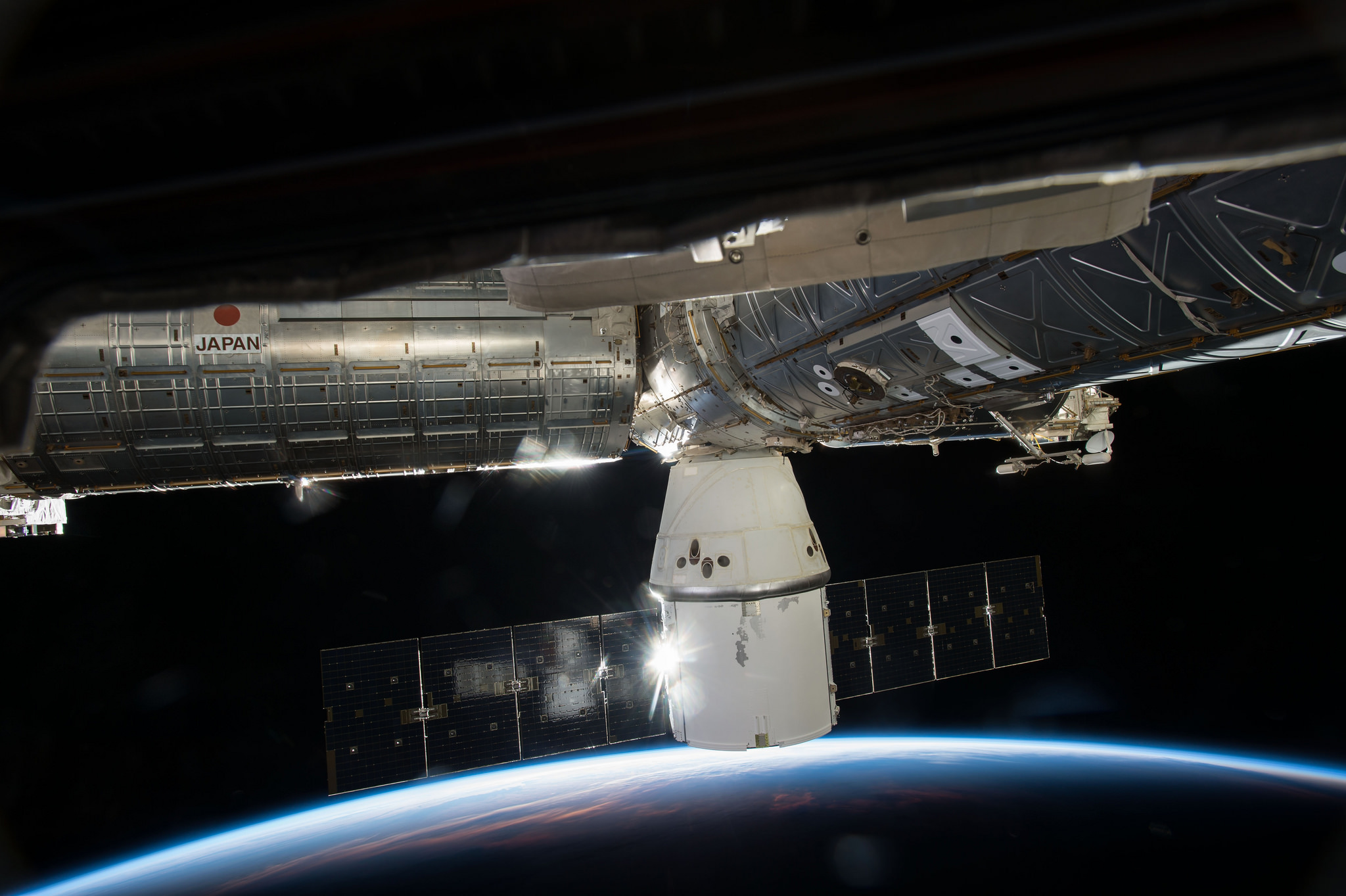 SpaceX's Dragon cargo capsule is seen here docked to the ISS