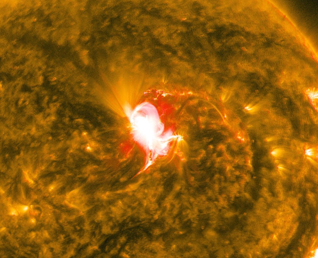 
			Sun Unleashes Mid-level Flare - NASA			