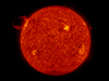The Sun with prominence visible in the upper left taken by the AIA instrument on board SDO.