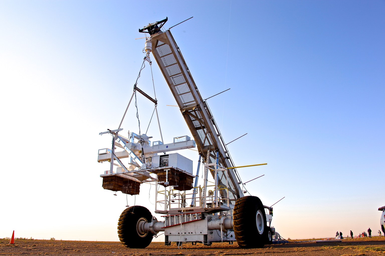 The WASP payload is supported by a crane prior to the balloon launch.