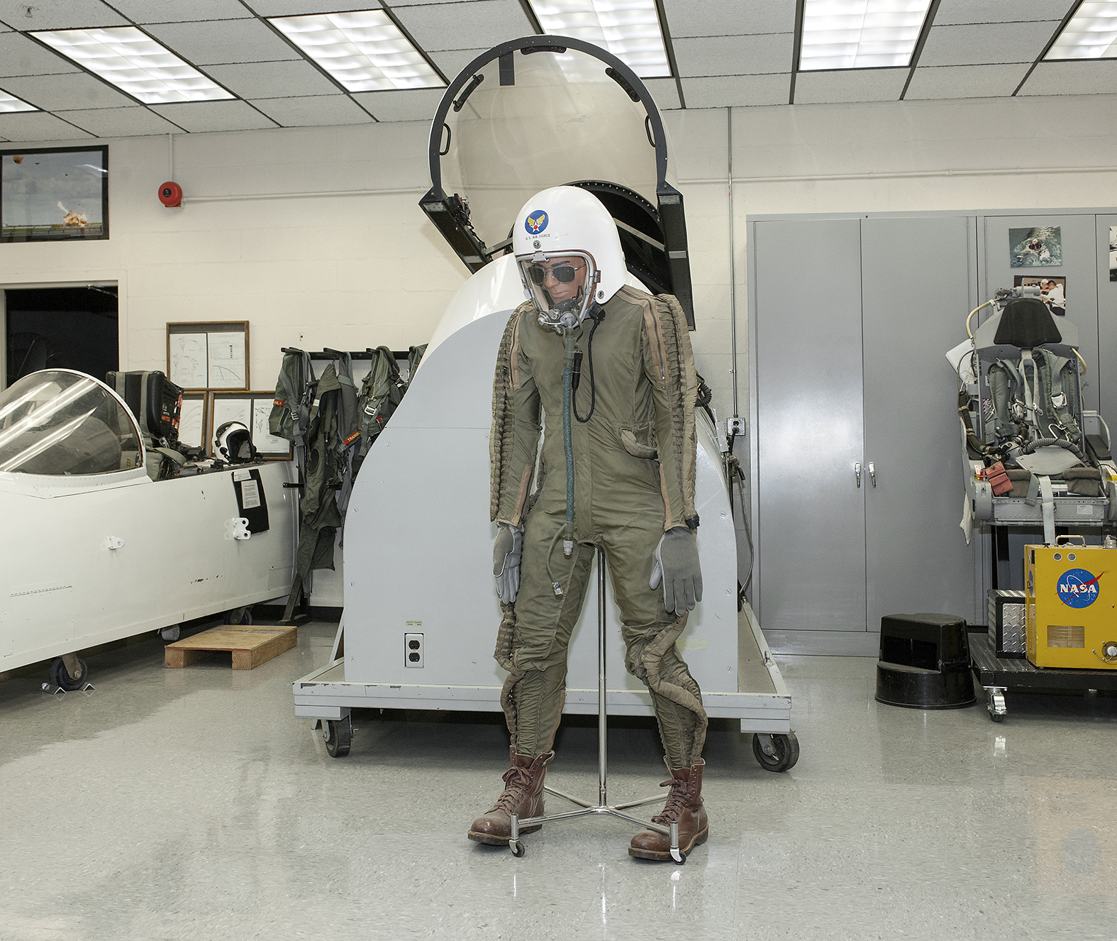 Display of a pilot wearing a partial-pressure spacesuit.