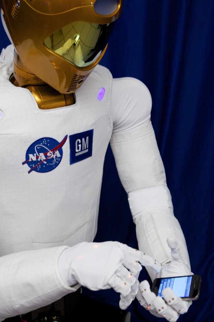 Robonaut types on a smart phone
