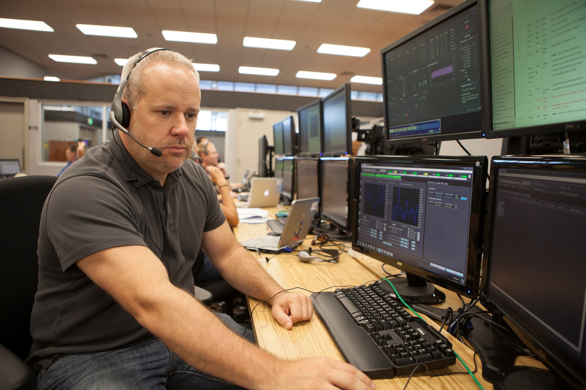 James Smith monitors RESOLVE simulation in Firing Room 4 control room.