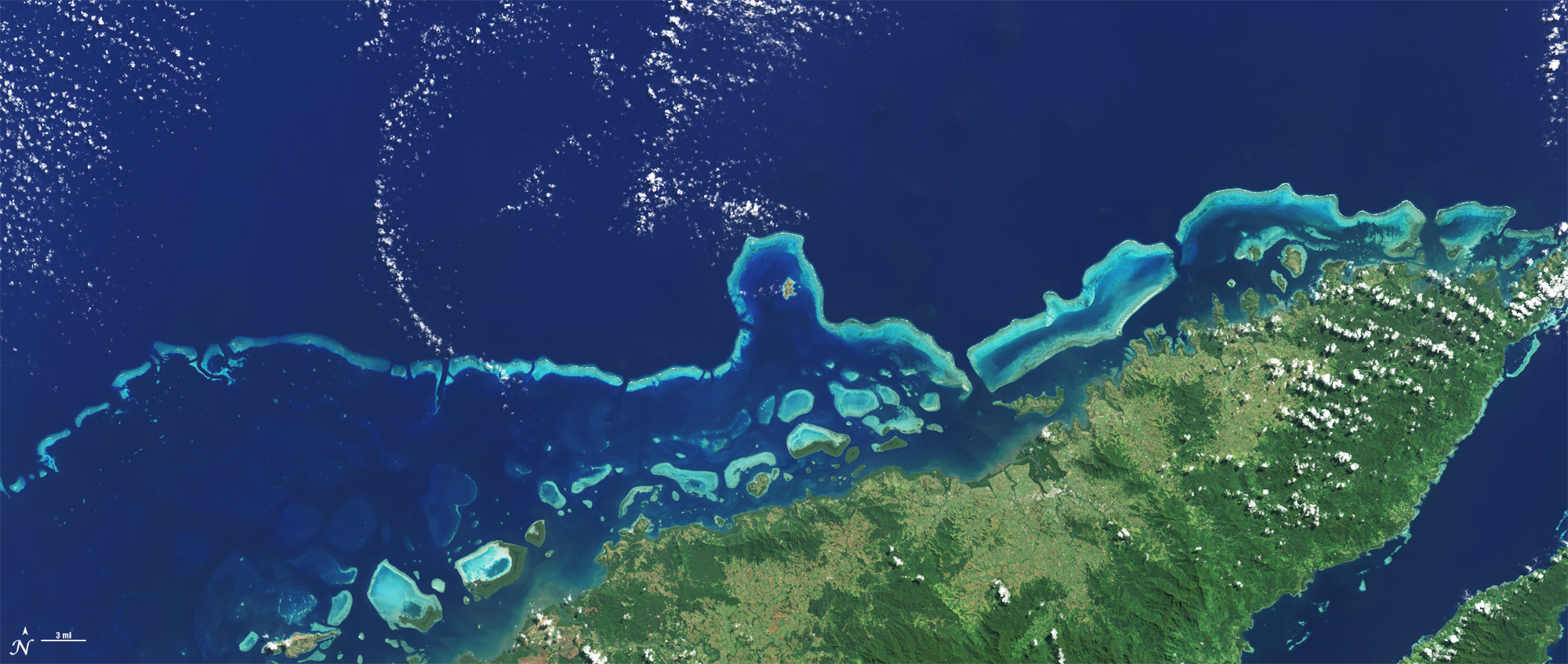 The extensive coral reefs on the northern shore of Vanua Levu, Fiji’s second largest island, can be seen on this natural color L