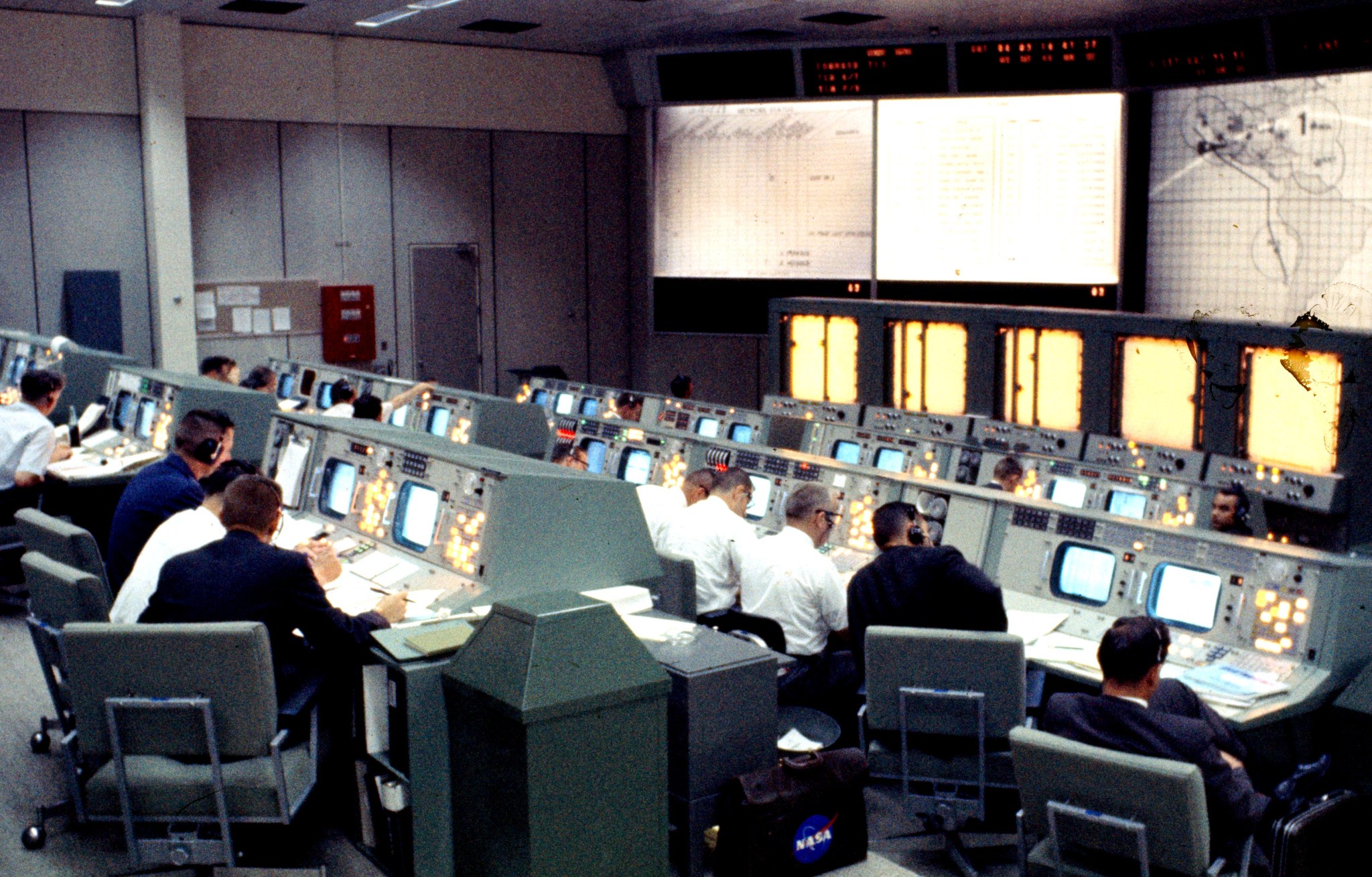 An overall view of Mission Control at the Manned Spacecraft Center in Houston during the early hours of the Gemini IV flight.