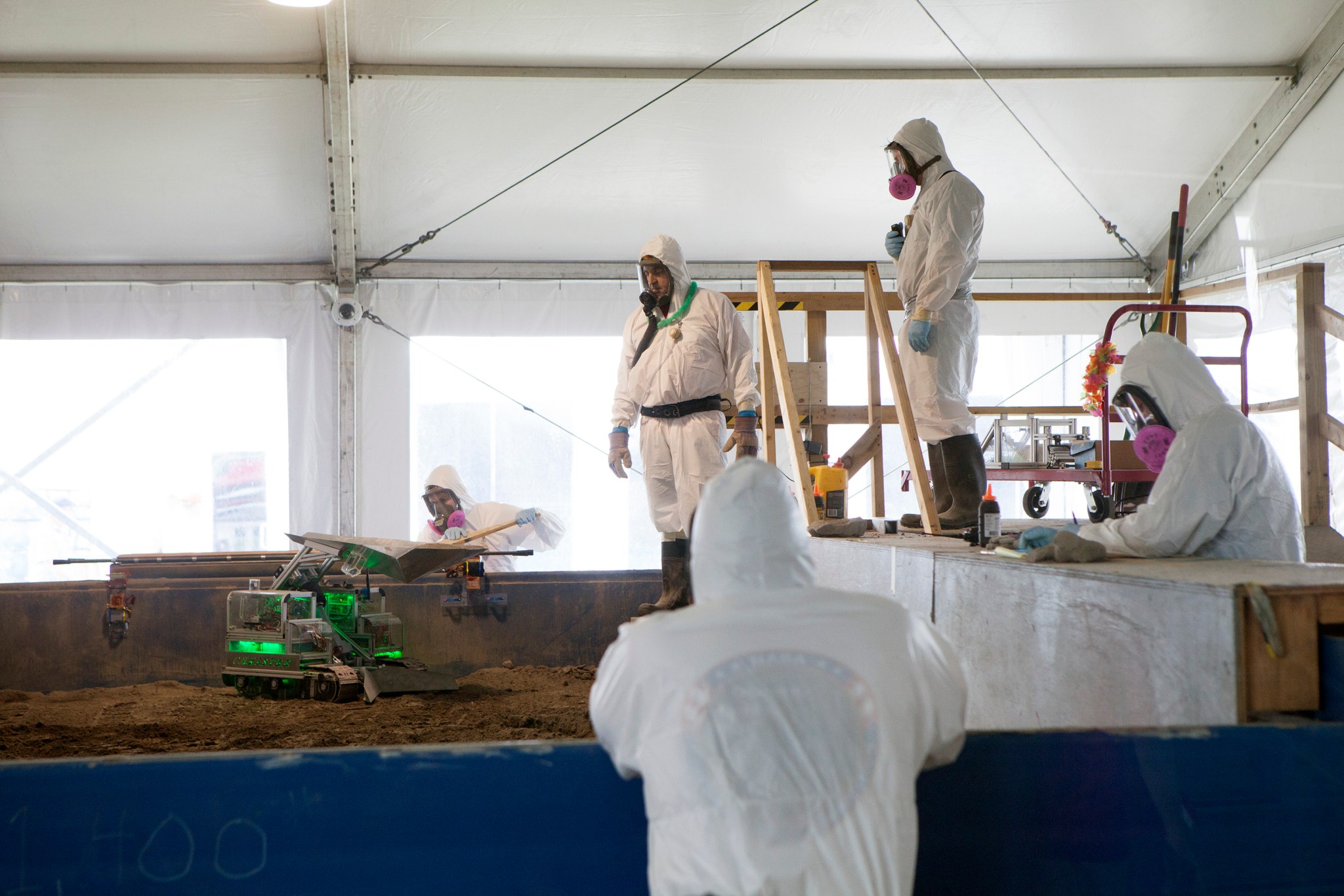 A robot miner completes its 10-minute run in the mining arena.