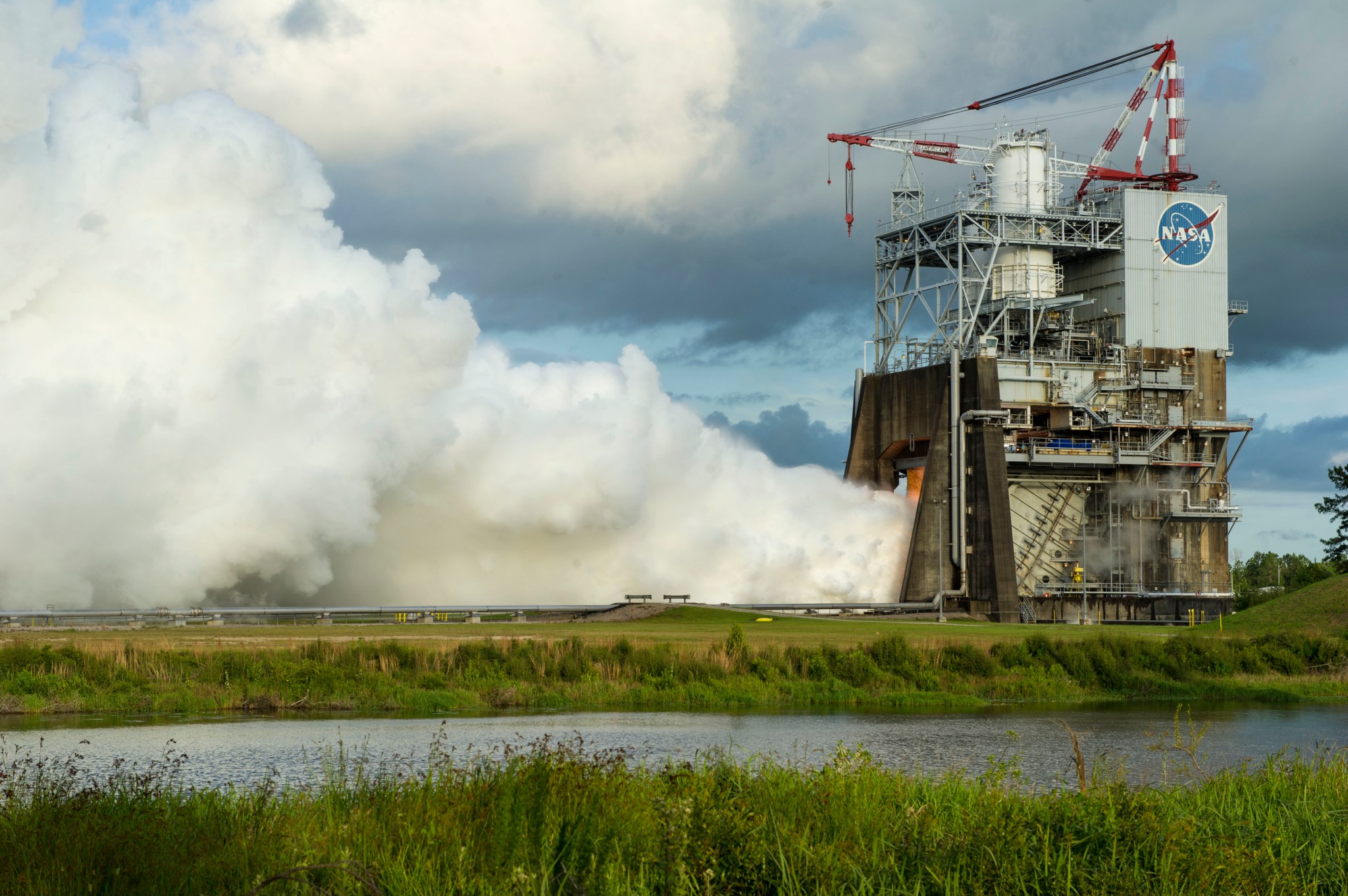 A billowing plume of steam signals a successful 450-second test of the RS-25 rocket engine