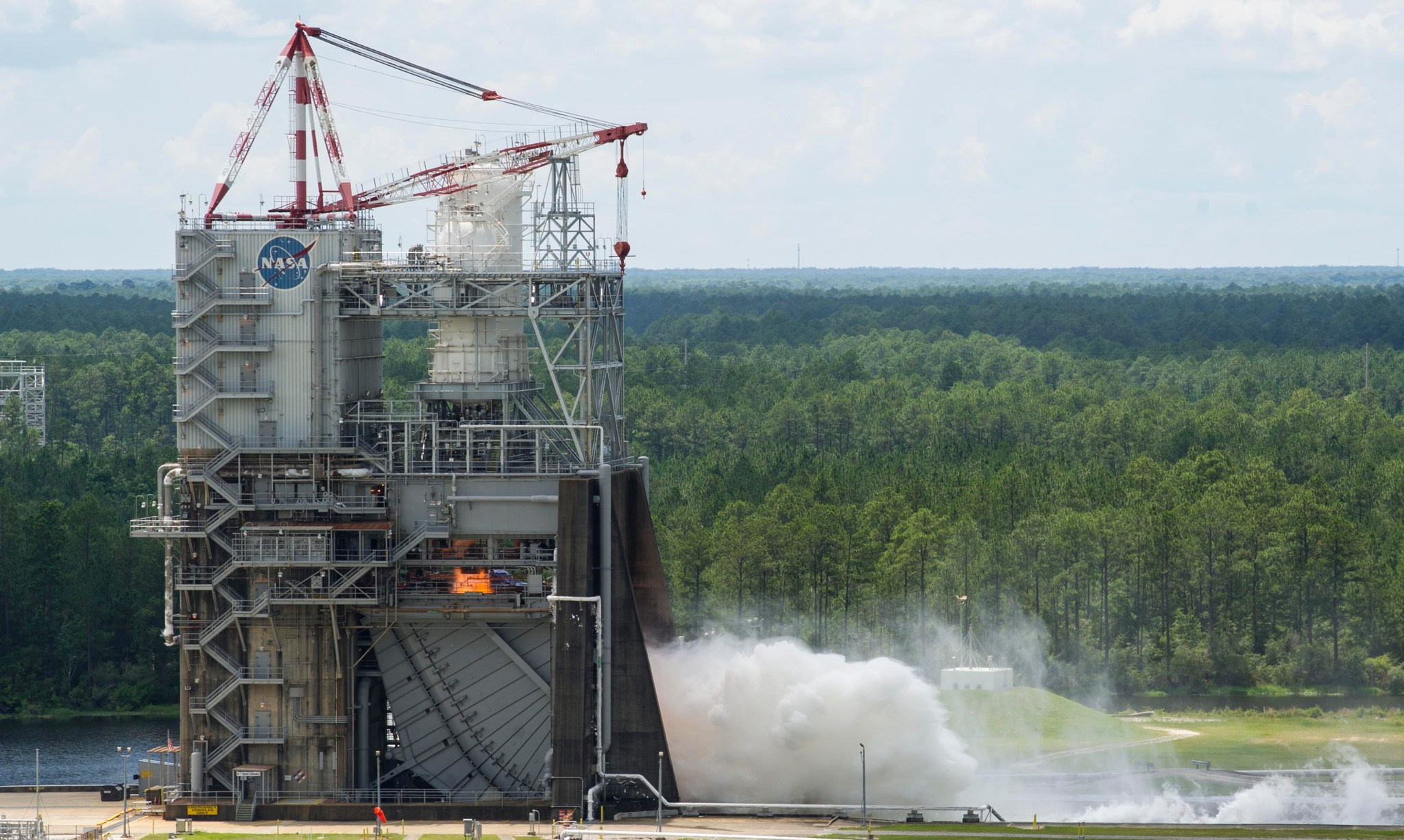 The RS-25 engine fires up at the beginning of a 500-second test June 11 at NASA's Stennis Space Center near Bay St. Louis, Miss.