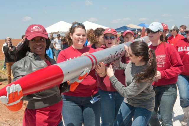 University students prepare their rocket for launch.