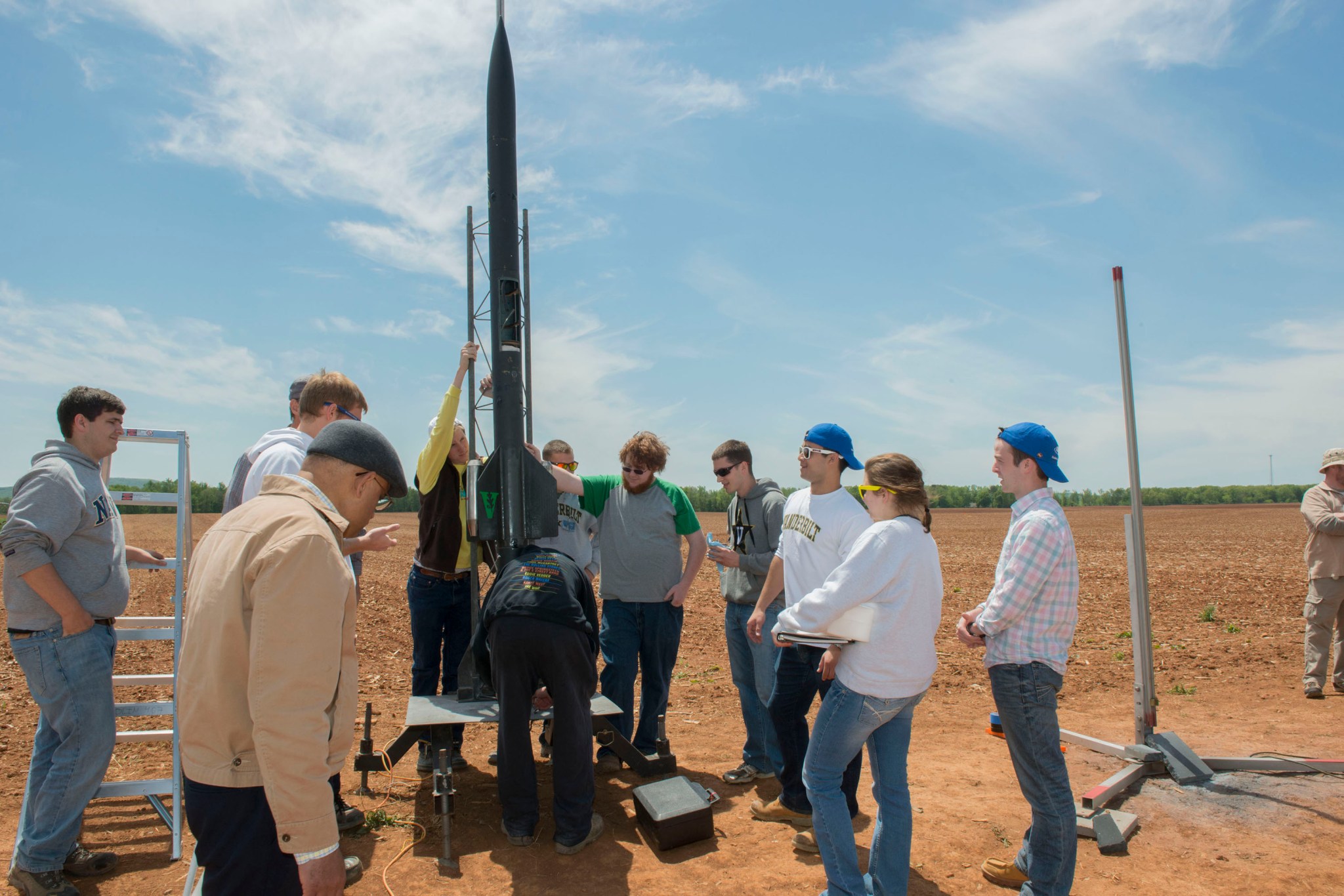 University students prepare their rocket for launch.