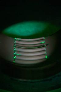 Fluorescent penetrant indicate surface anomalies in a penetrant test.