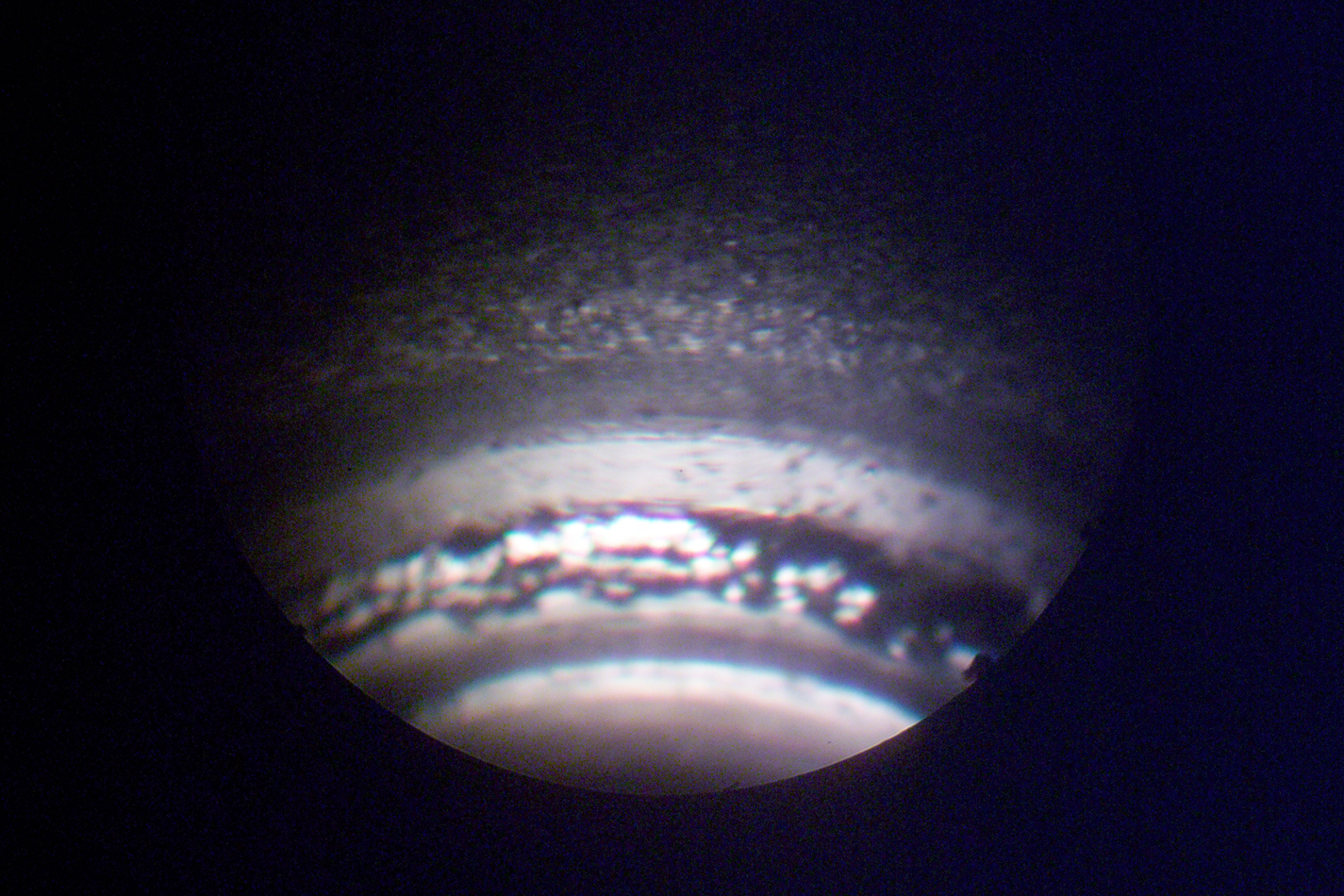 Borescope interior weld images of a propulsion flight thruster.