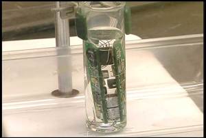 An immersion test of a pressure transducer circuit board in hydrazine.