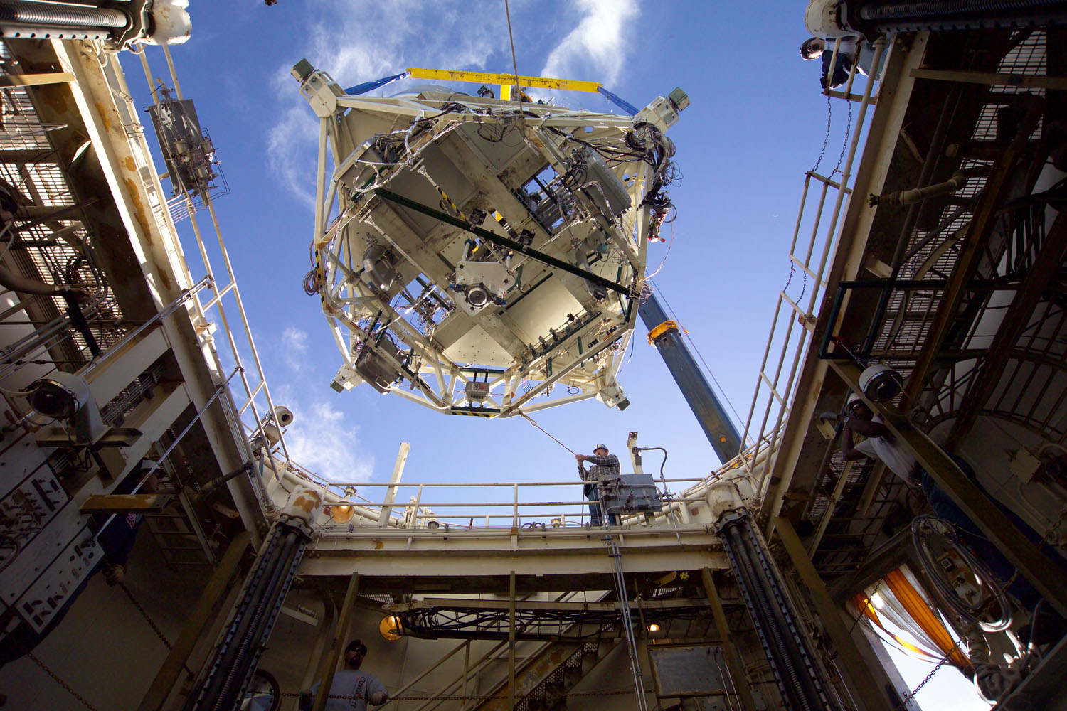  A propulsion system is carefully being lowered into one of our vacuum test stands.