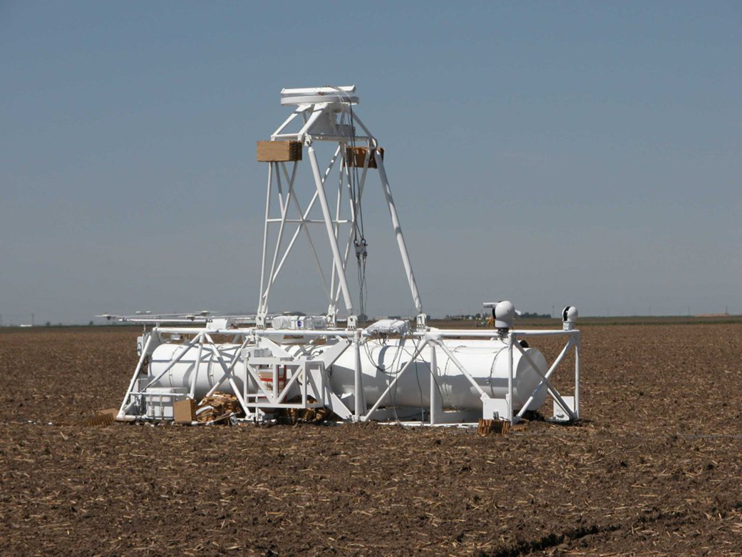 A balloon-borne gondola bearing NASA's HERO science mission safely lands in a Kansas field in 2005.
