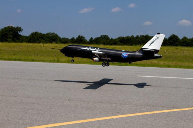 Unmanned aerial vehicle taking off a runway.