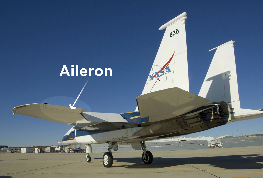 NASA aircraft sits on a runway. The aileron is highlighted