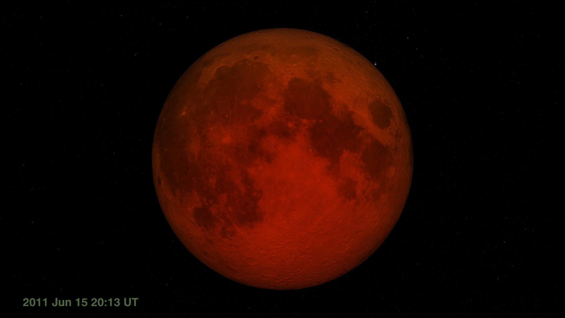 A reddish-orange picture of our moon during a total lunar eclipse