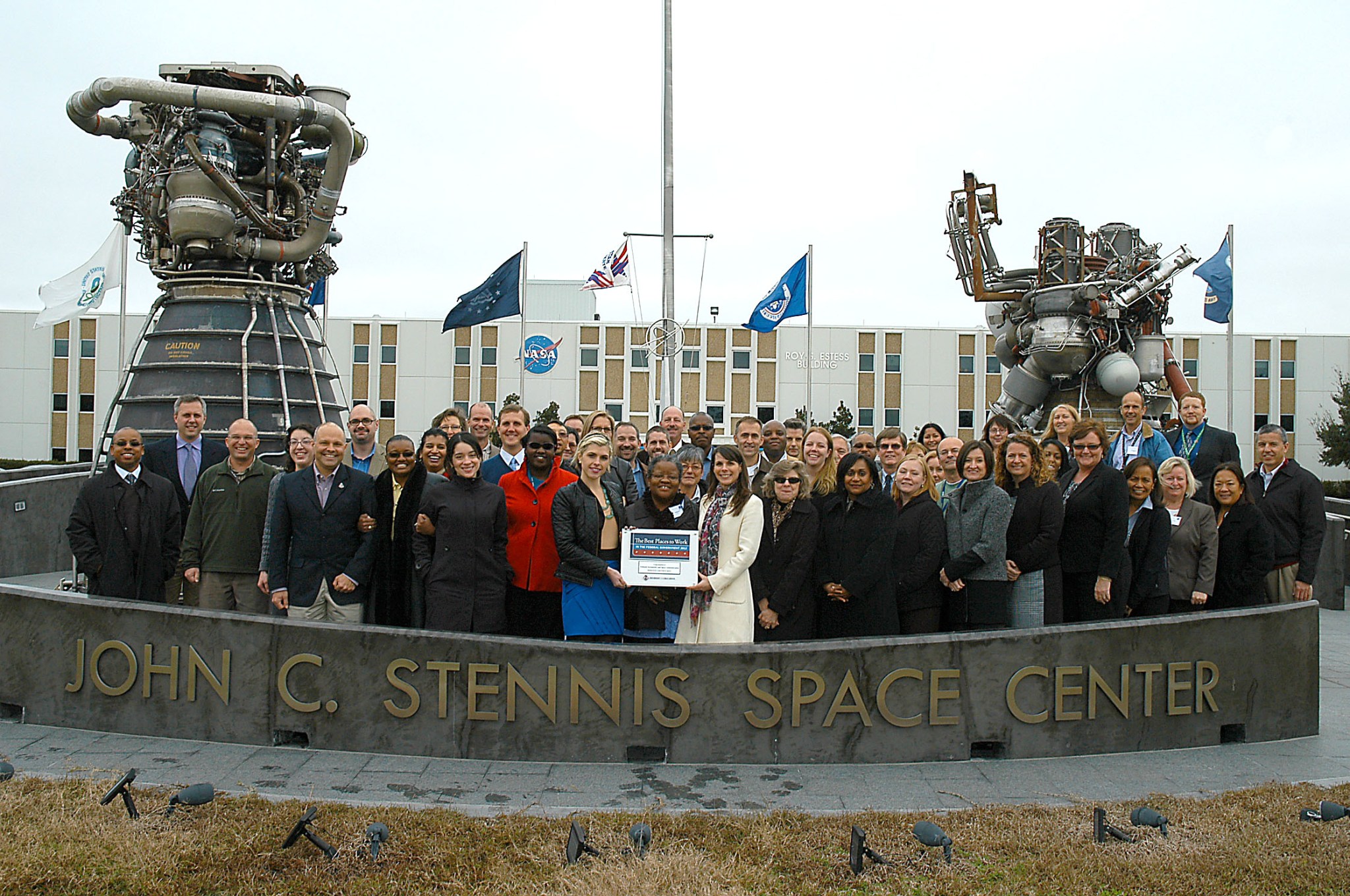 Group picture of workers standing outside at Stennis Space Center