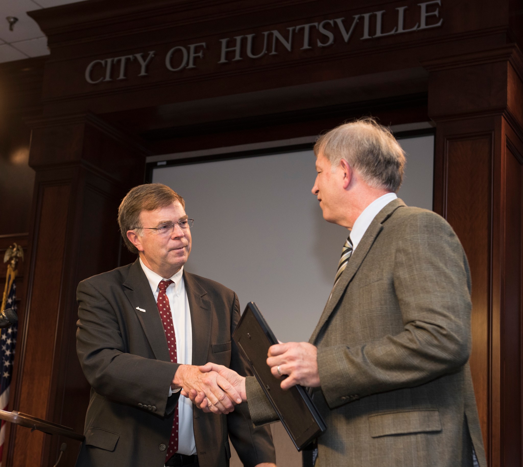 Dr. William Emrich, right, and Huntsville Mayor Tommy Battle.