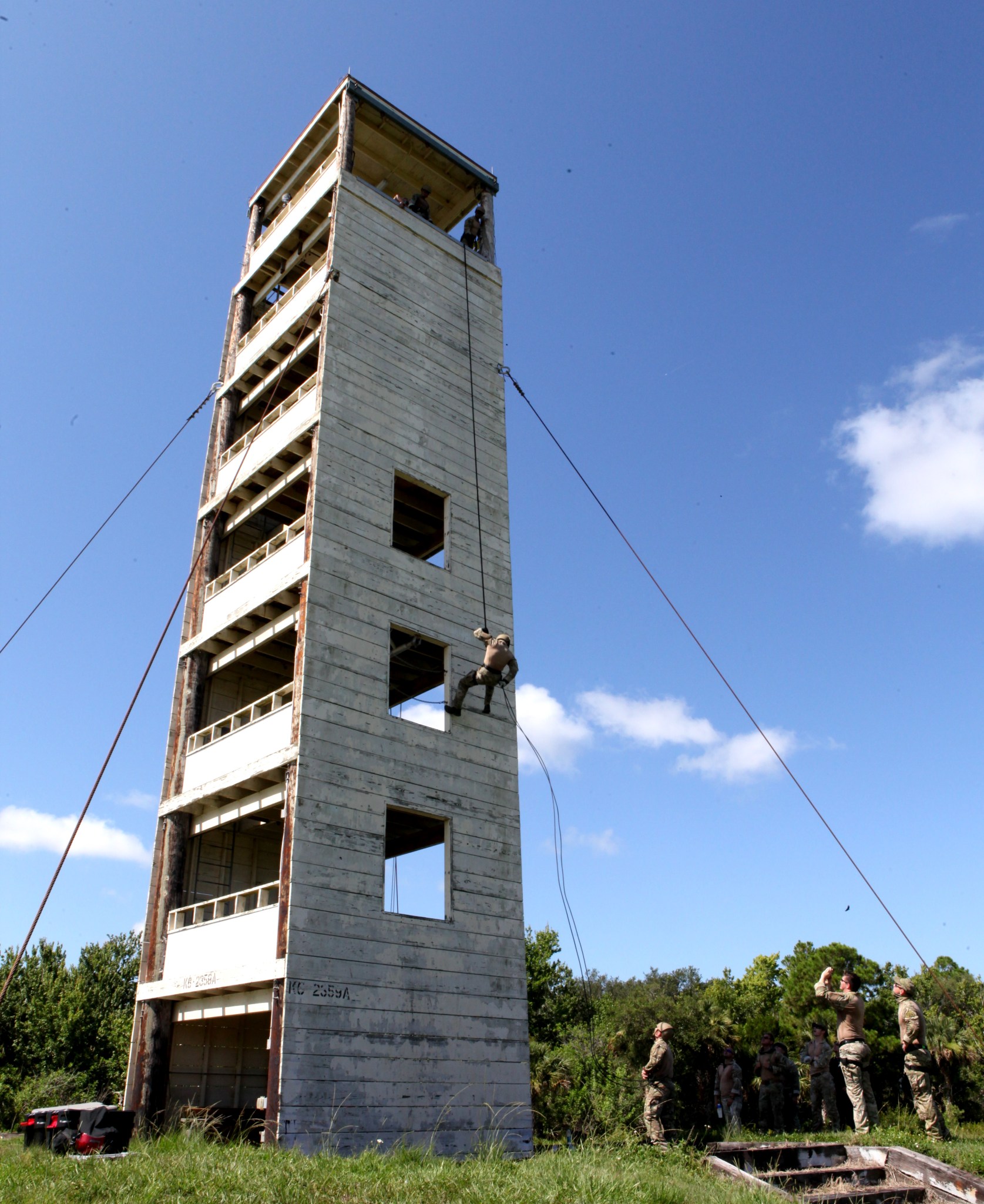 Repelling down a seven-story training tower