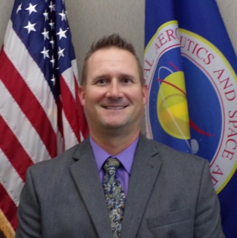 A headshot of Mike Ravenscroft, manager of the Commercial Crew Program's Launch Vehicle System Office.