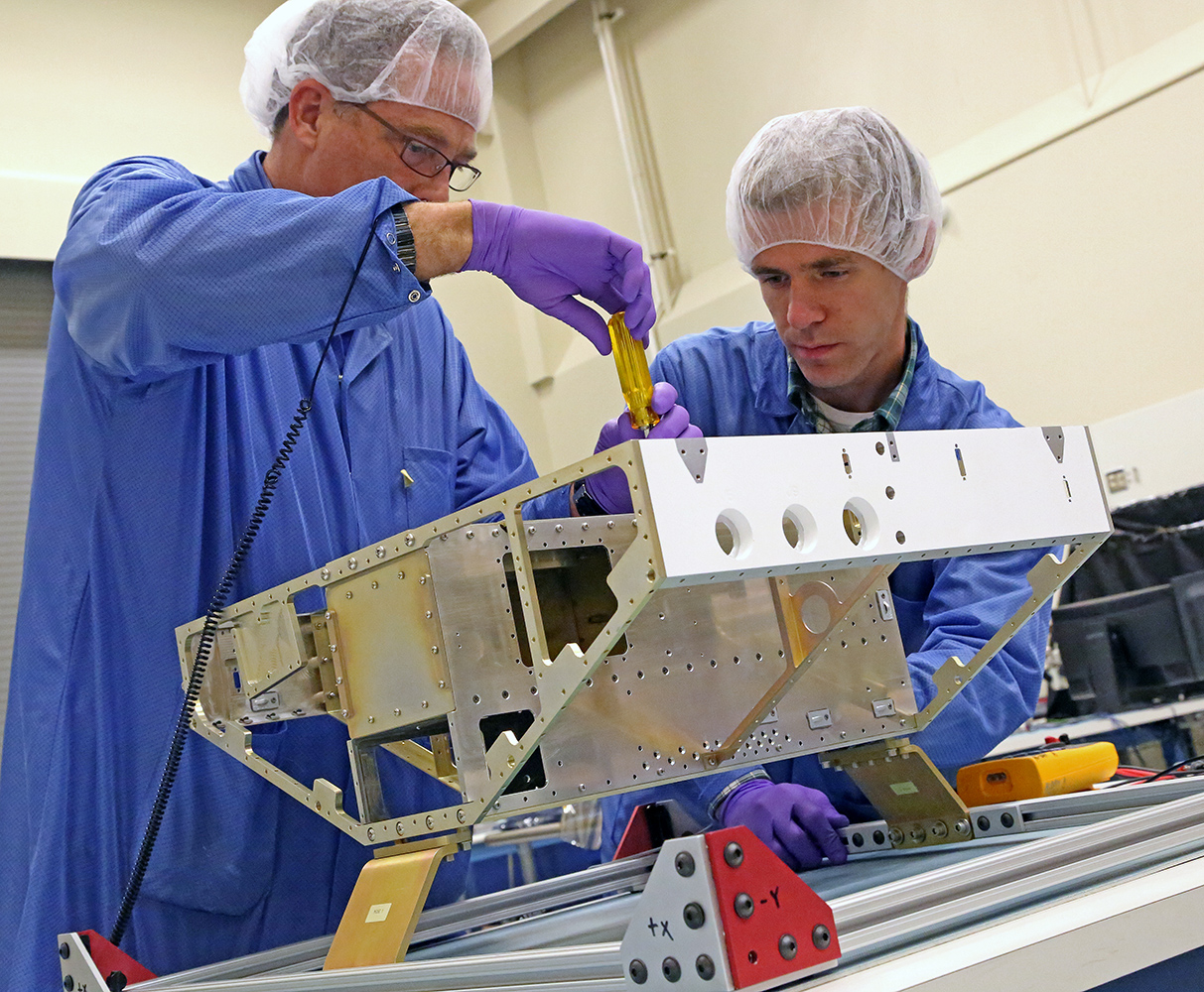 Engineers begin construction of the first of eight microsatellites for NASA’s CYGNSS mission