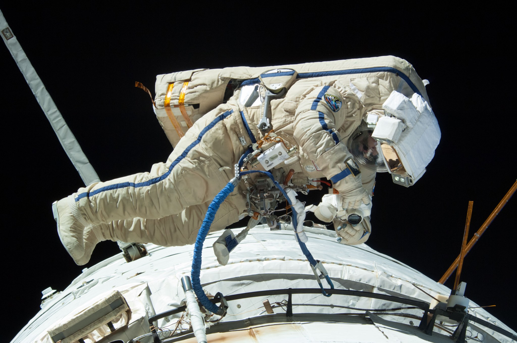 Russian cosmonaut Alexander Misurkin conducting a spacewalk