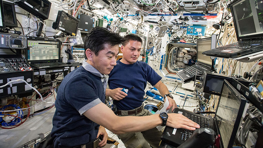 Astronauts Kimiya Yui and Kjell Lindgren