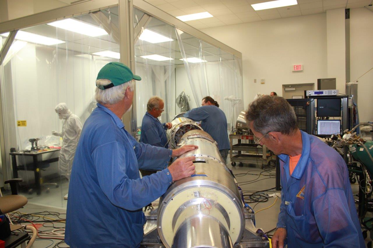 Engineers work on the final steps of integrating the MOSES-2 sounding rocket payload