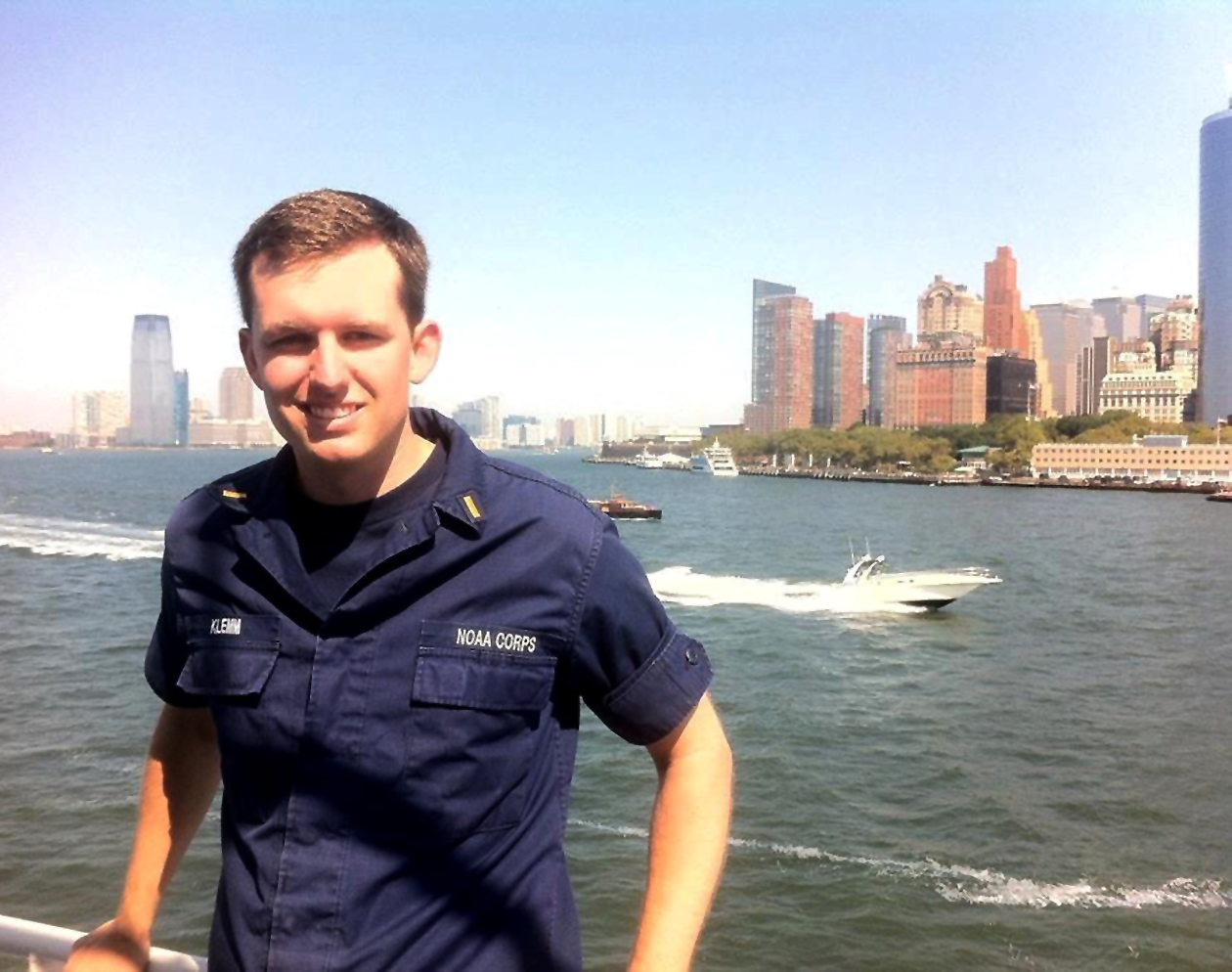 man with harbor in background