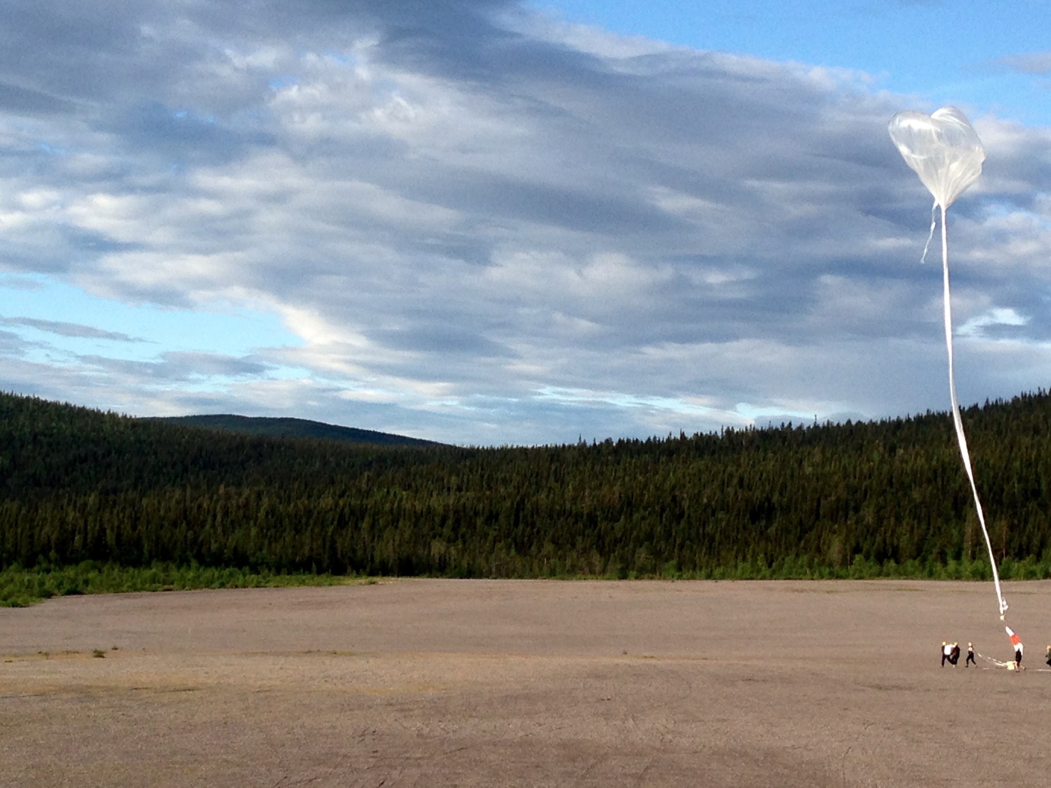 balloon launching in an open field