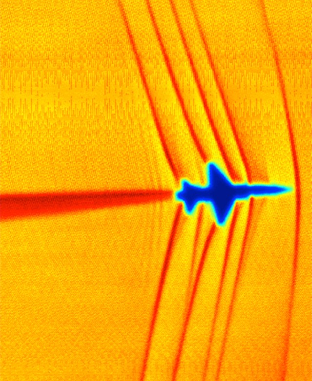 Schlieren image of shock waves created by a T-38C in supersonic flight