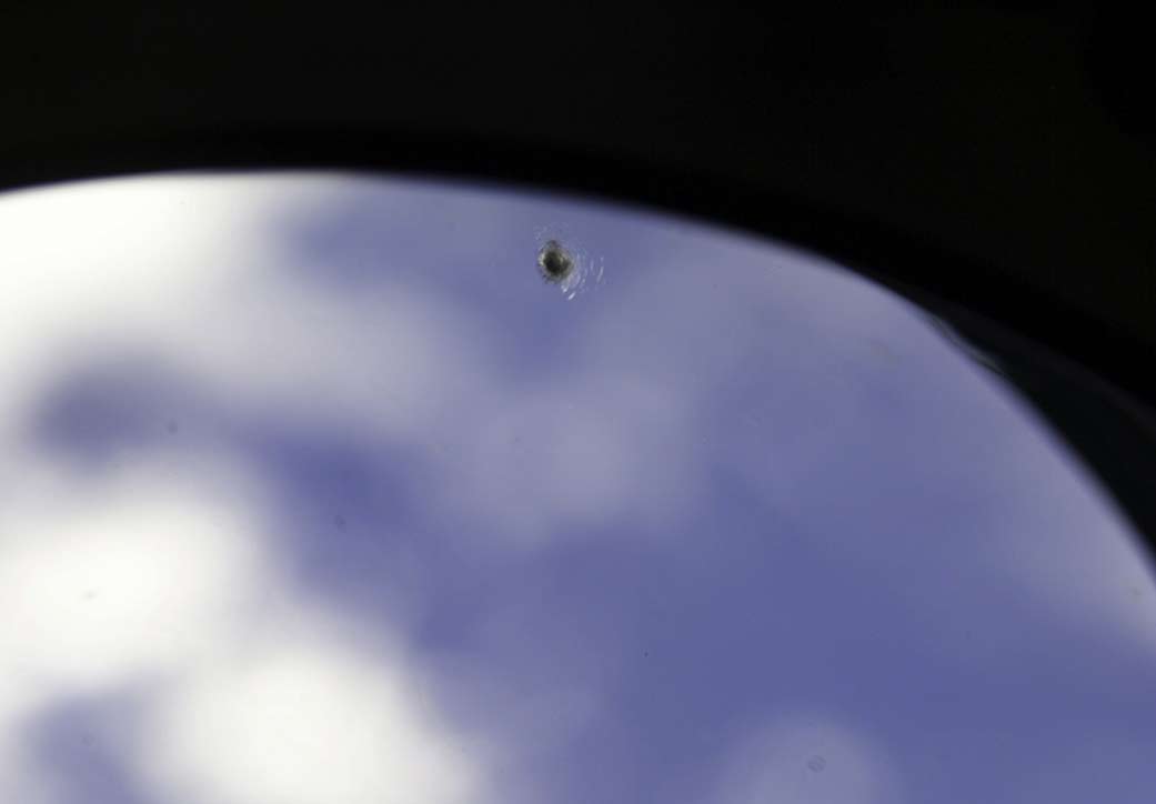 Micrometeoroid / orbital debris (MMOD) impact on window # 7 of the International Space Station