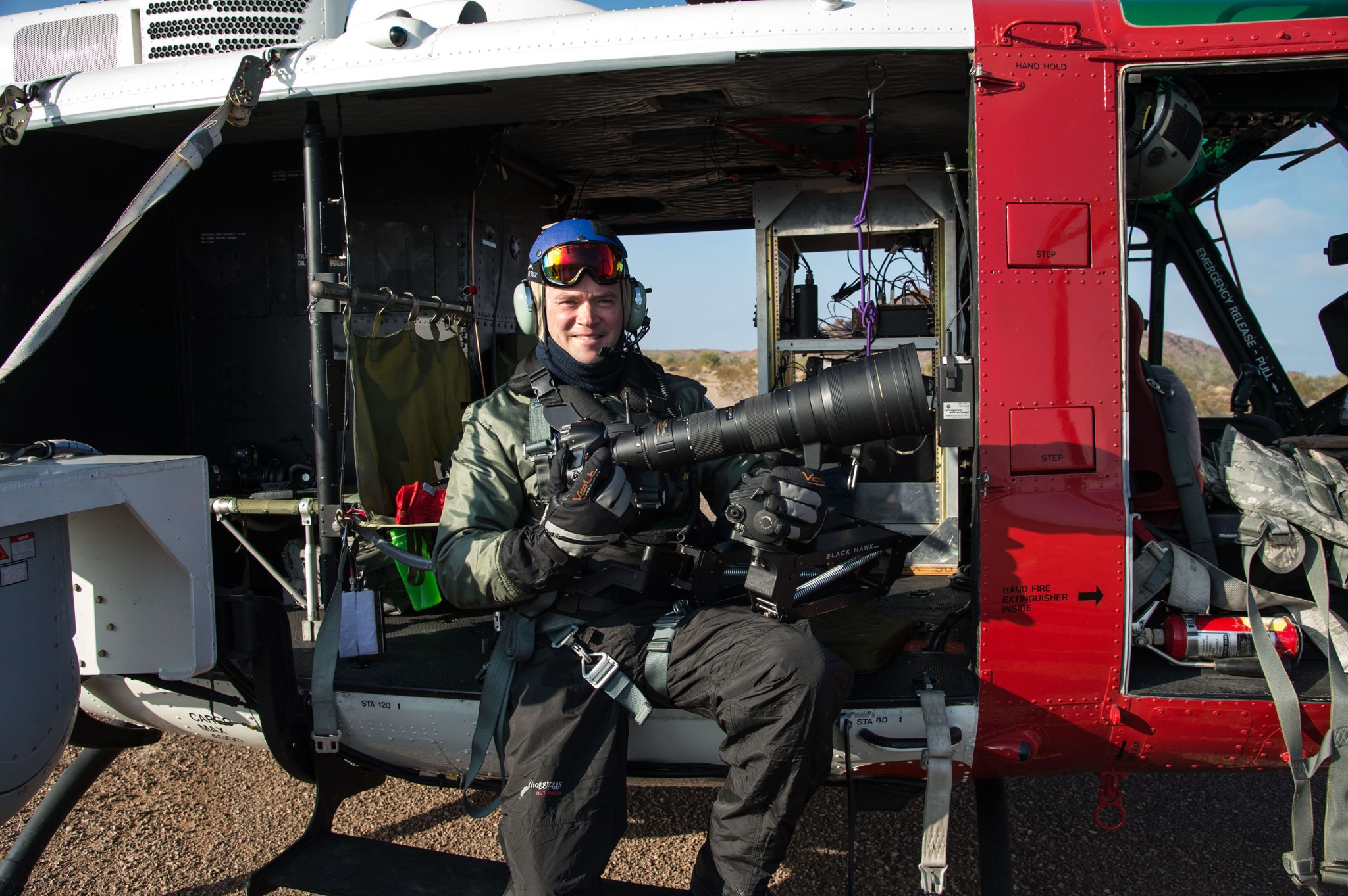 James Blair, a photographer at NASA Johnson Space Center, Houston, is prepared to take still images of the Orion parachute tests