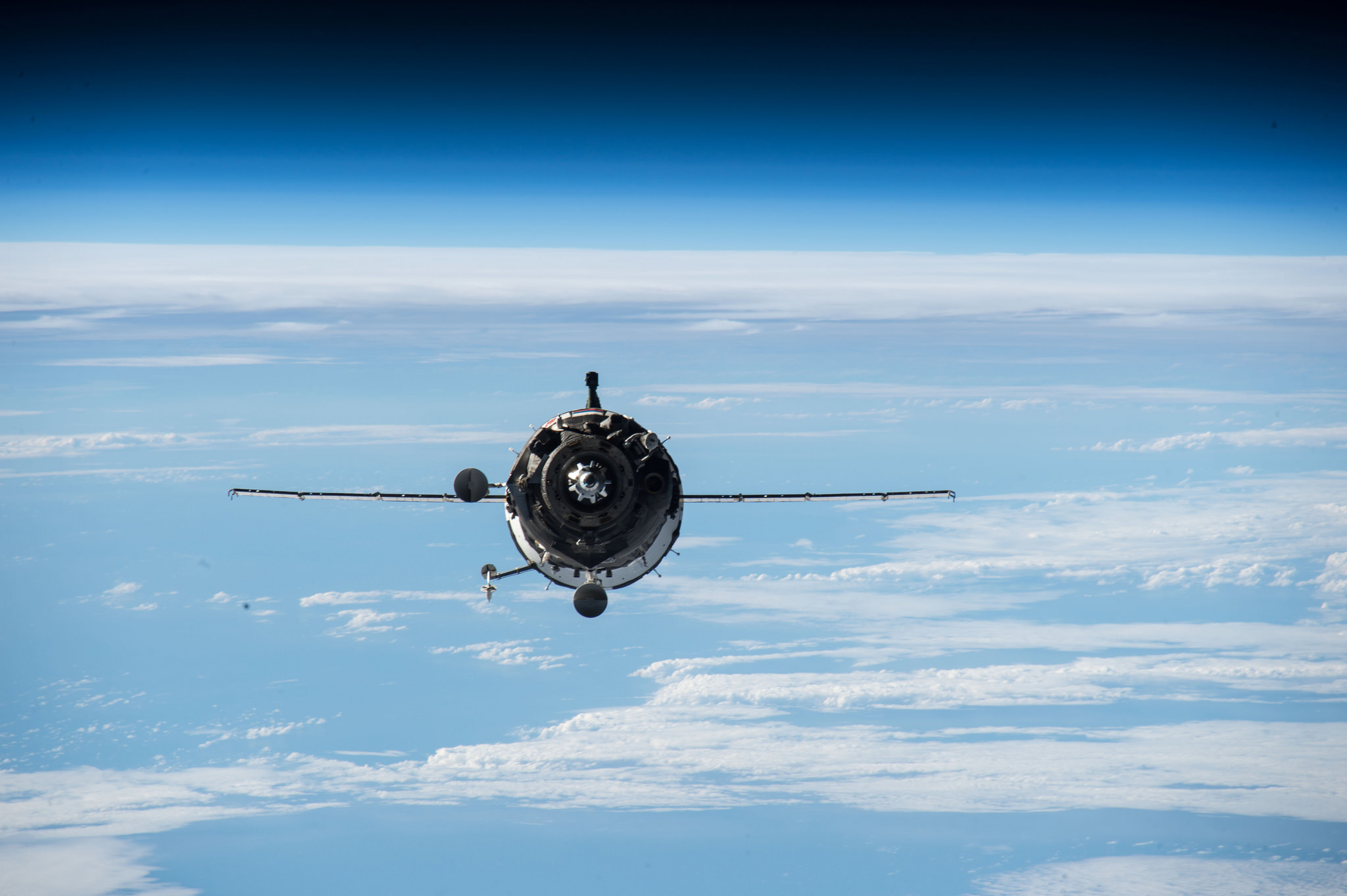 Three International Space Station crew members are set to return aboard the Soyuz TMA-16M spacecraft.