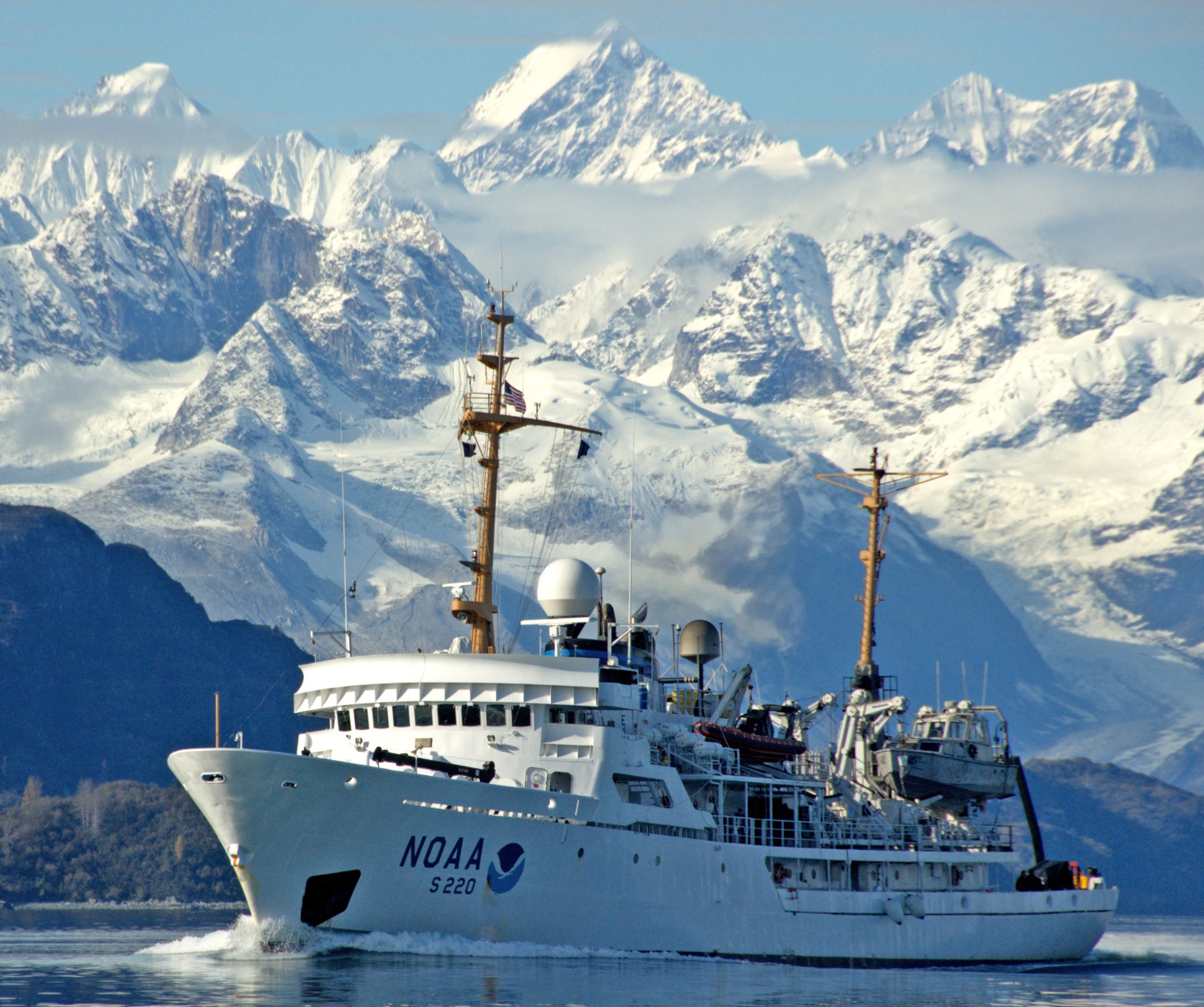 ship with mountains in background