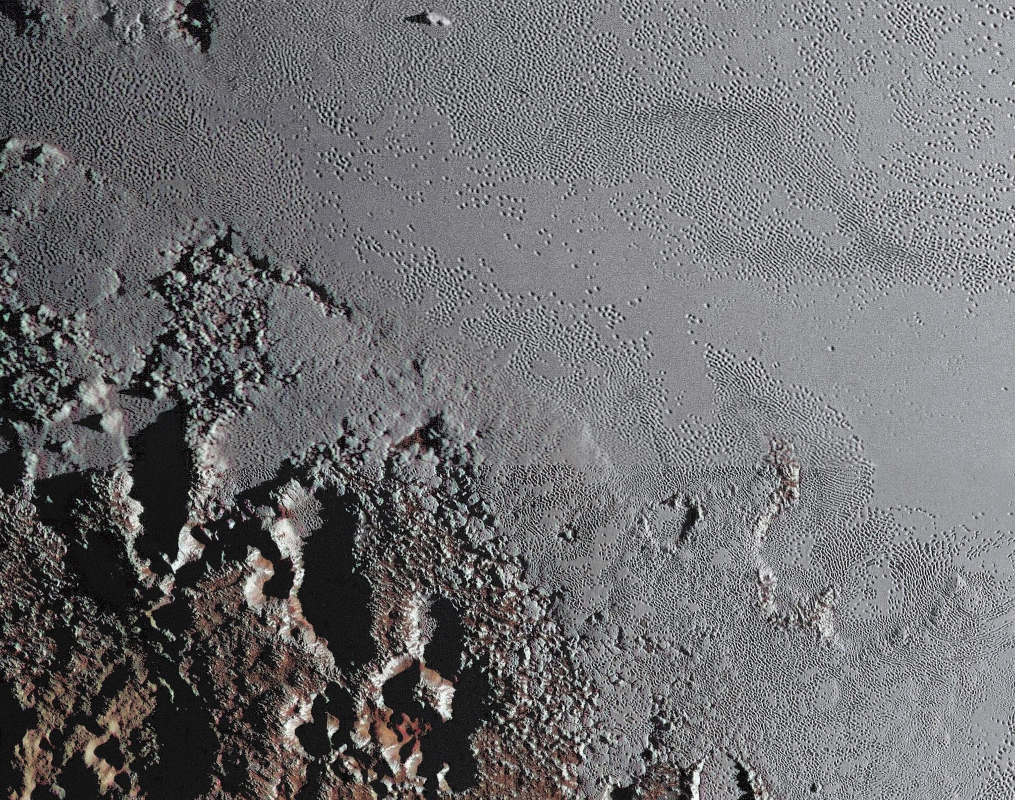NASA’s New Horizons spacecraft zooms in on the southeastern portion of Pluto’s great ice plains, where at lower right the plains.