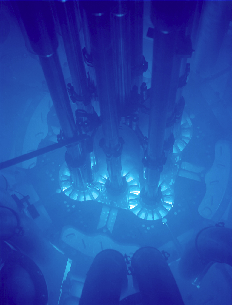 Nuclear fuel glows blue in a submerged reactor core