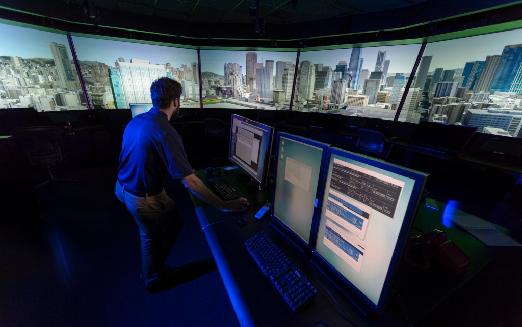 Future Flight Central (FFA) in N262 showing out the window views and consoles monitoring for San Francisco for UAM UTM Ride Quality Simulation project. In no particular order Marc Shaw-Lecerf, Jay Nguyen, Kim Hoy, Faisal Omar and Madison Goodyear participate in the exercise.