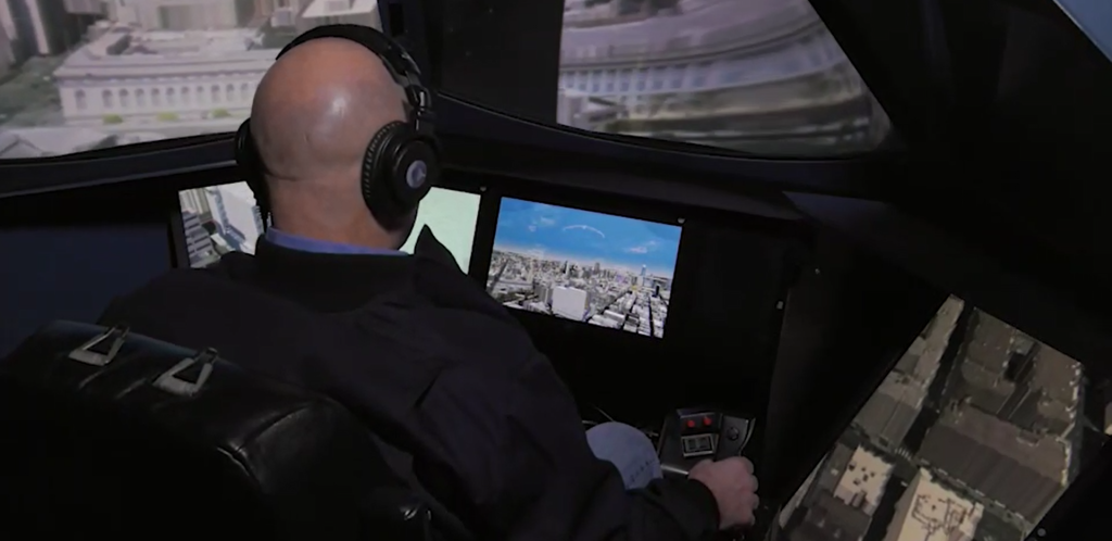 Pilot flying the Vertical Motion Simulator's San Francisco eVTOL simulation to determine the handling qualities of the vehicle.